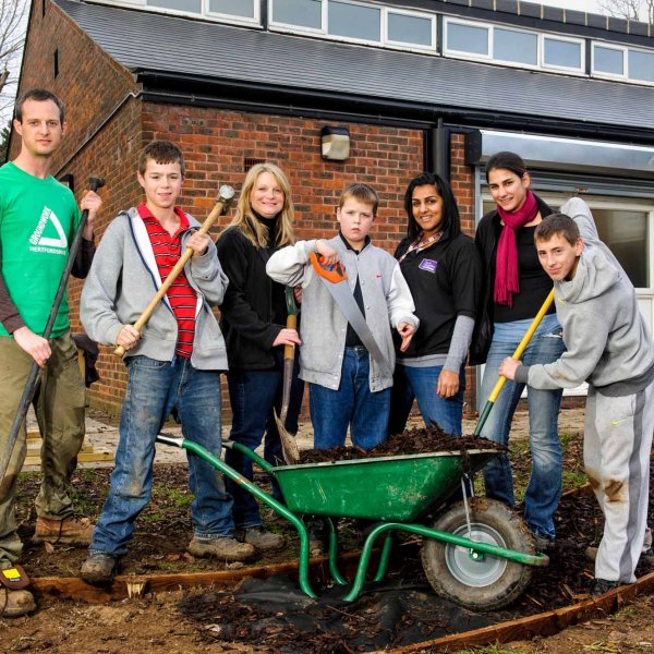 path 008  © Licensed to simonjacobs.com. 08/12/2012 Borehamwood, UK. Borehamwood. Youth workers at Affinity Sutton Farriers Hall building a bench and a pathway. L to R: Chris Dungate, Dylan Aldrich  16, Sarah Parkhouse, Tyler Aldrich 13, Manju Inagal, Alyannah Miller and Harry Mockett 14.Photo credit: Simon Jacobs.