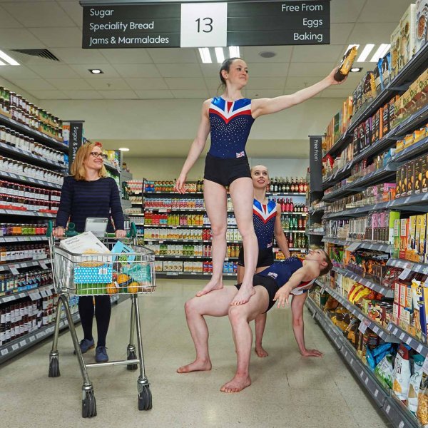 waitrose_gymnast_sj_035  © Licensed to Mercury Press & Media. 29/04/2015 Kingston, UK. Waitrose partner, Josie Russell, 20 trains with Team GB Acrobatic gymnastics team members Jennifer Bailey 18 and Cicely Irwin 15 at the Waitrose store in Kingston.Photo credit : Simon Jacobs/Mercury Press